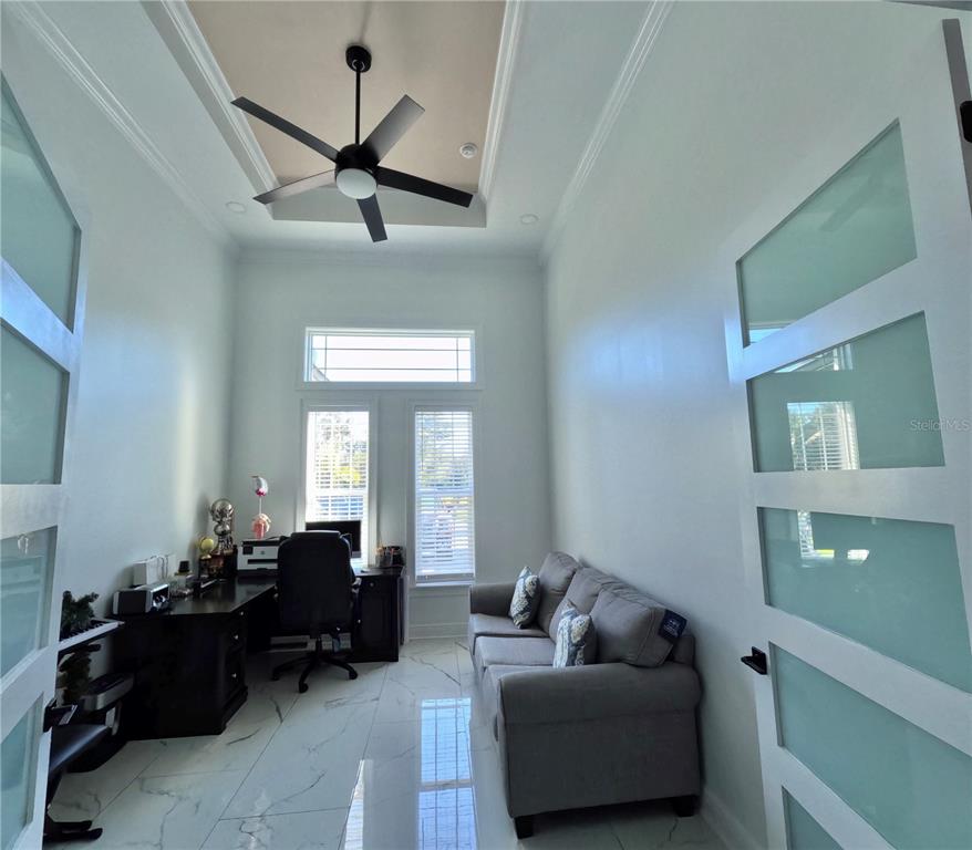 10112 Judy Road Dover, FL 33527 - Photo 10 of 50 a living room with furniture and a window
