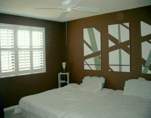 9846 West McNab Road, Unit 9846 Tamarac, FL 33321 - Photo 5 of 8 Master Bedroom
