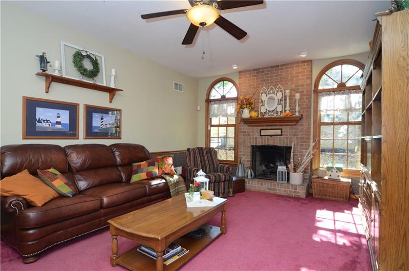 480 Sebring Road Beaver, PA 15009 - Photo 12 of 25 The floor to ceiling gas fireplace and large palladium windows make this a truly special room.