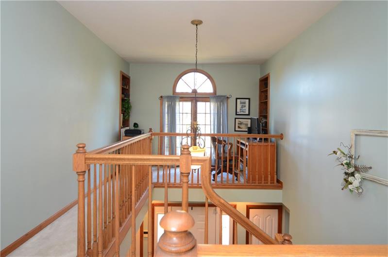480 Sebring Road Beaver, PA 15009 - Photo 14 of 25 This open loft area would be a good space for an office or study room.