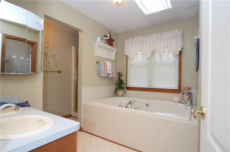 480 Sebring Road Beaver, PA 15009 - Photo 18 of 25 Master bath has dual sinks, a separate shower and commode area plus the jetted garden tub.