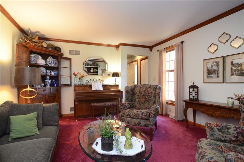 480 Sebring Road Beaver, PA 15009 - Photo 3 of 25 Large living room for your guests and your treasures. Let agent know if you are interested in the piano.