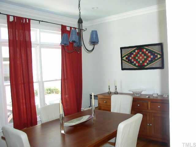 217 Stable Road Carrboro, NC 27510 - Photo 2 of 10 Lovely dining room with natural light and hardwood floors.