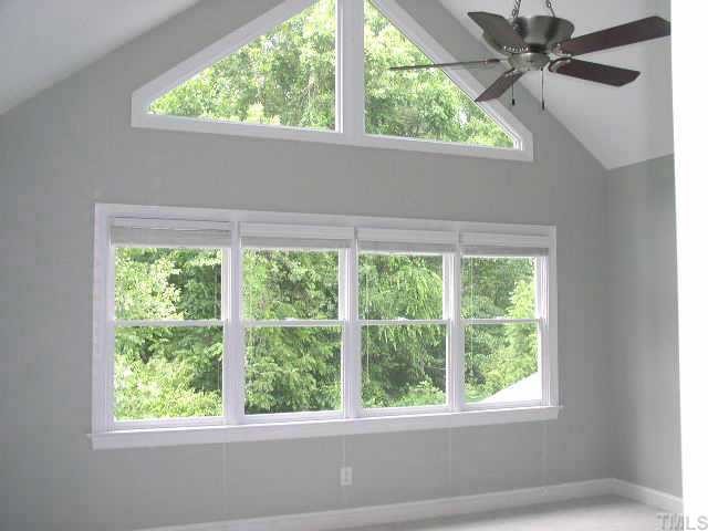 217 Stable Road Carrboro, NC 27510 - Photo 7 of 10 Gorgeous master bedroom with great windows, a balcony, and a large delux master bath.