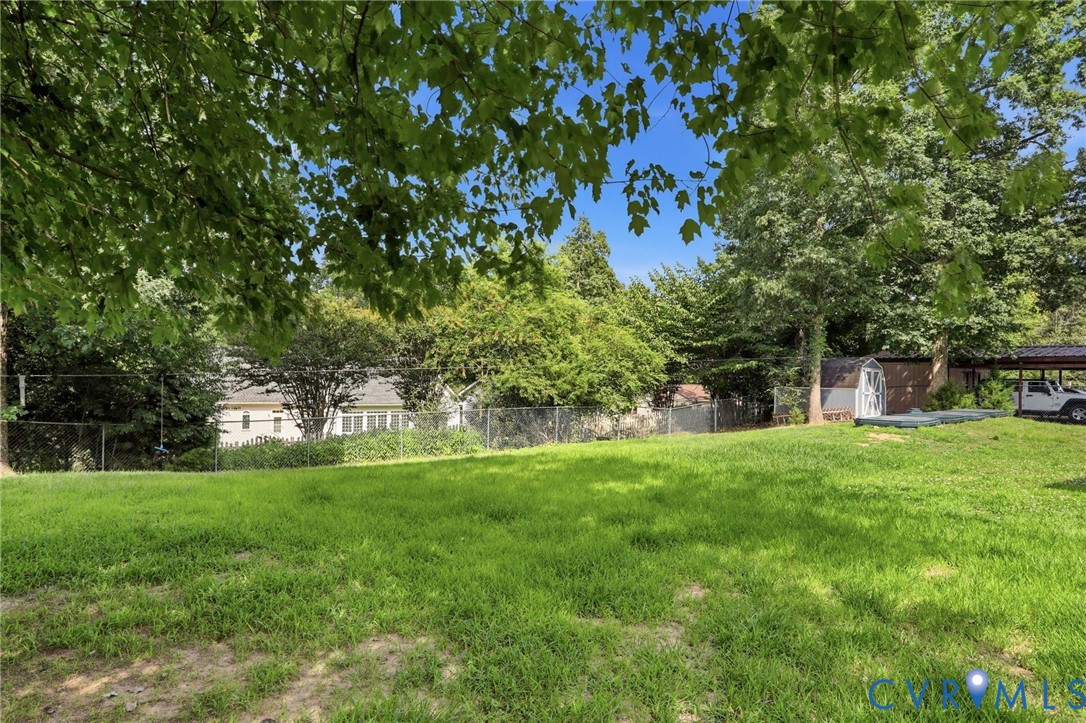 14420 Branding Iron Road Chesterfield, VA 23838 - Photo 42 of 50 Expansive grassy yard with mature trees