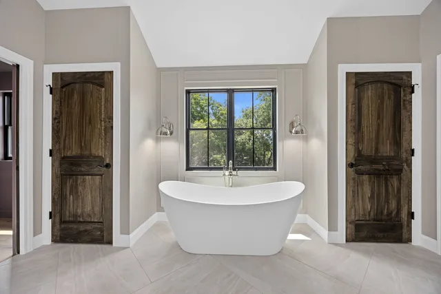 a view of a storage & utility room with a window