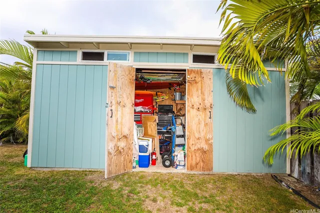 a view of outdoor space and front view of yellow house