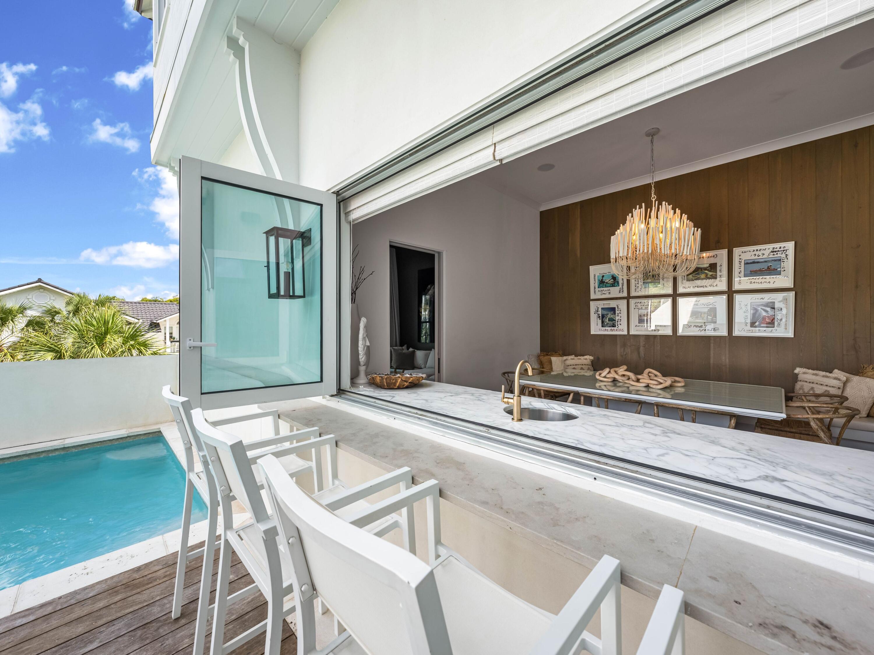 41 Elysee Ct Inlet Beach Inlet Beach, FL 32461 - Photo 15 of 68 a view of a dining room with furniture window and wooden floor