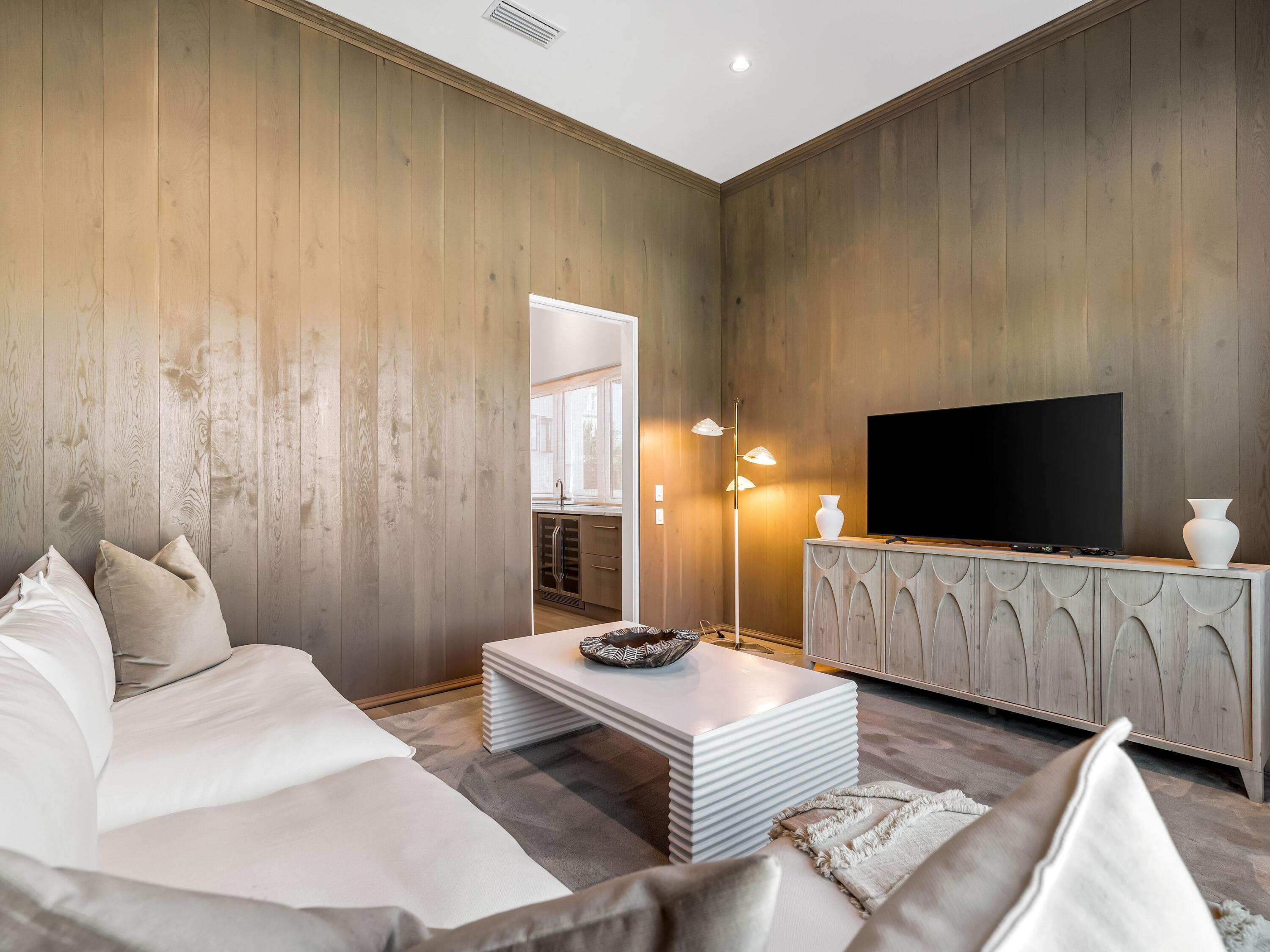 41 Elysee Ct Inlet Beach Inlet Beach, FL 32461 - Photo 19 of 68 a living room with furniture and a flat screen tv