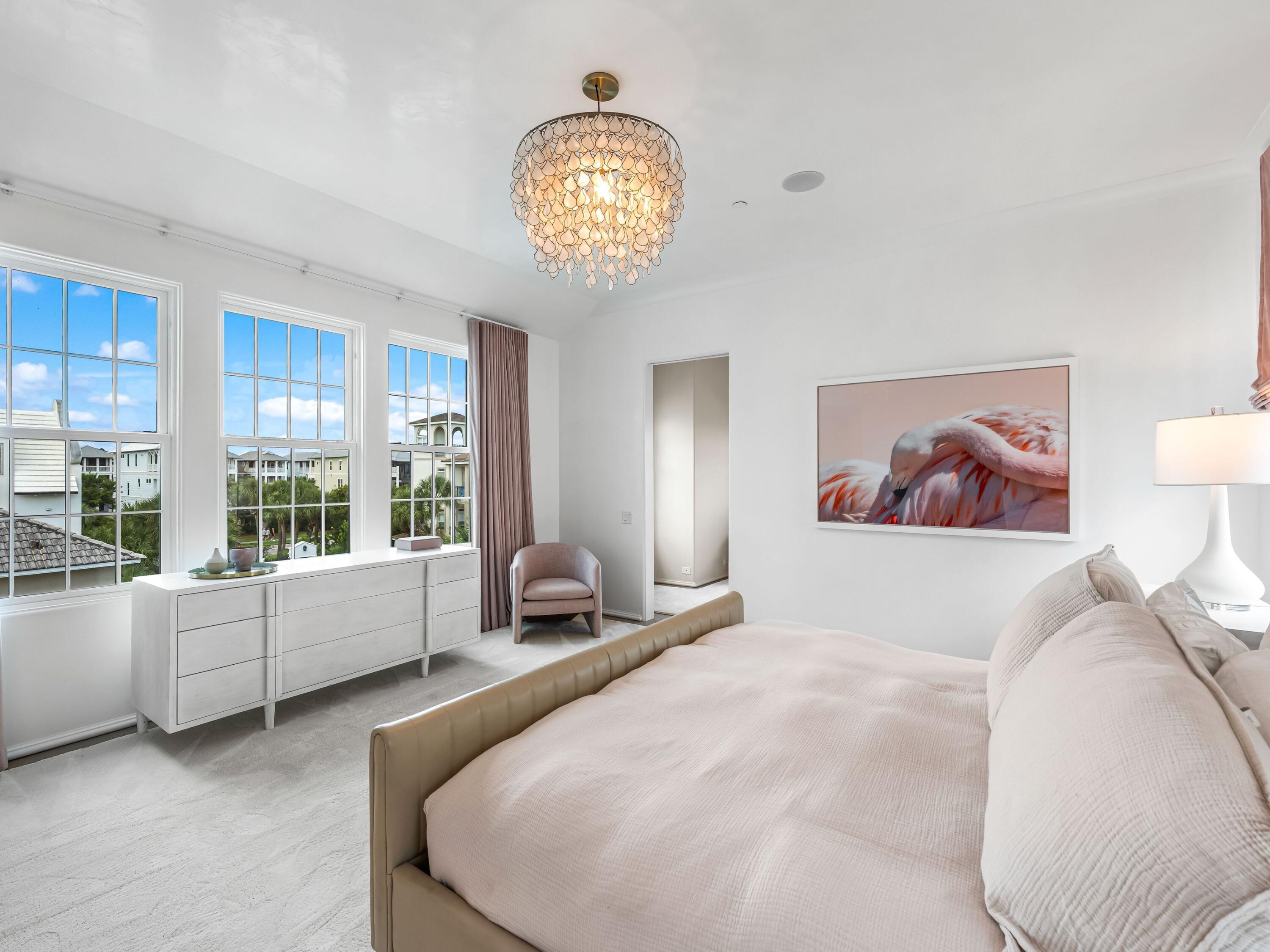 41 Elysee Ct Inlet Beach Inlet Beach, FL 32461 - Photo 22 of 68 a bedroom with a large bed and a large window