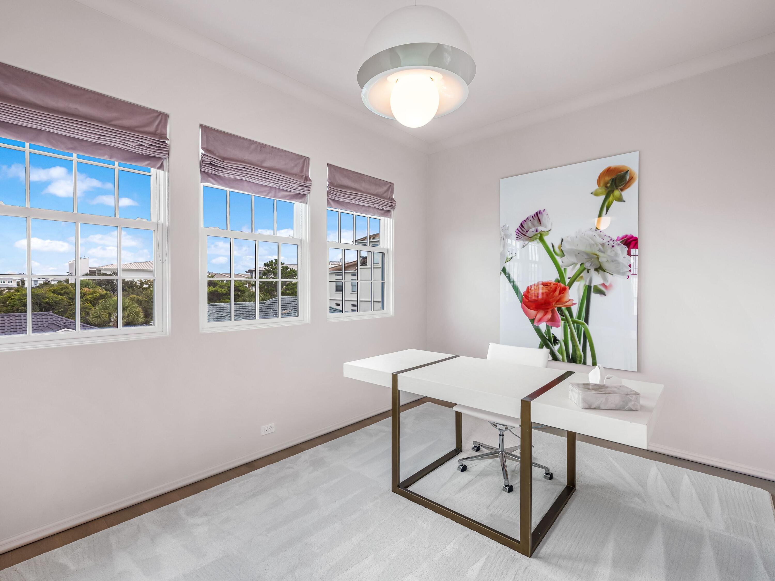 41 Elysee Ct Inlet Beach Inlet Beach, FL 32461 - Photo 23 of 68 a view of a dining room with furniture a chandelier and wooden floor