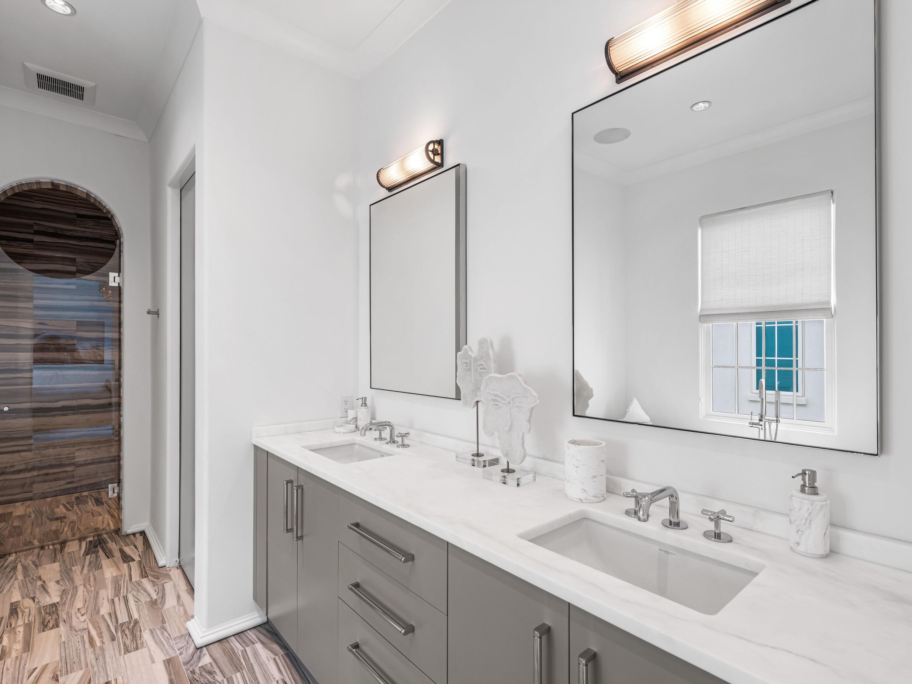 41 Elysee Ct Inlet Beach Inlet Beach, FL 32461 - Photo 24 of 68 a bathroom with a double vanity sink mirror and double