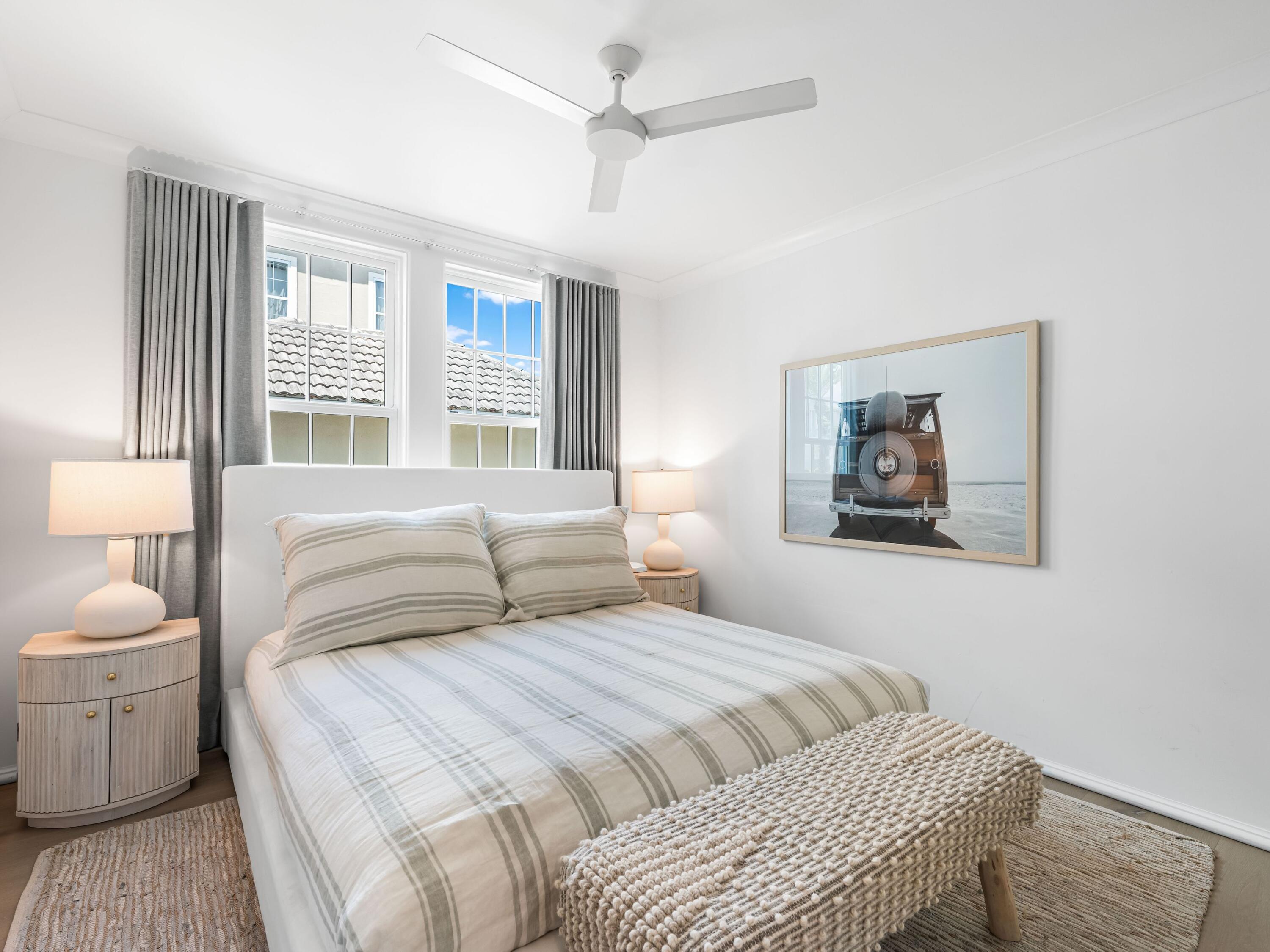 41 Elysee Ct Inlet Beach Inlet Beach, FL 32461 - Photo 34 of 68 a bedroom with a bed and a painting on the wall