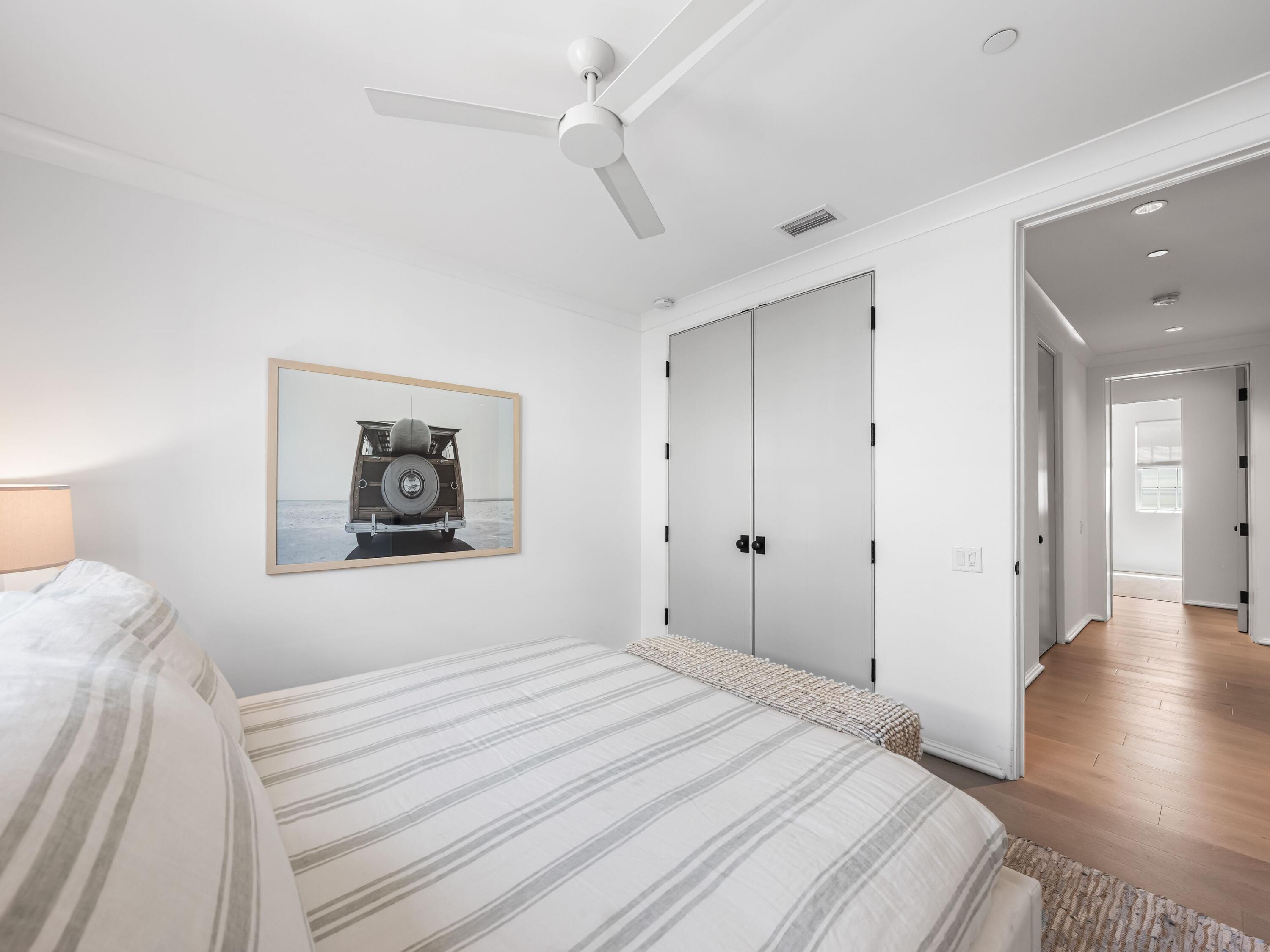 41 Elysee Ct Inlet Beach Inlet Beach, FL 32461 - Photo 35 of 68 a bedroom with a bed and a painting on the wall