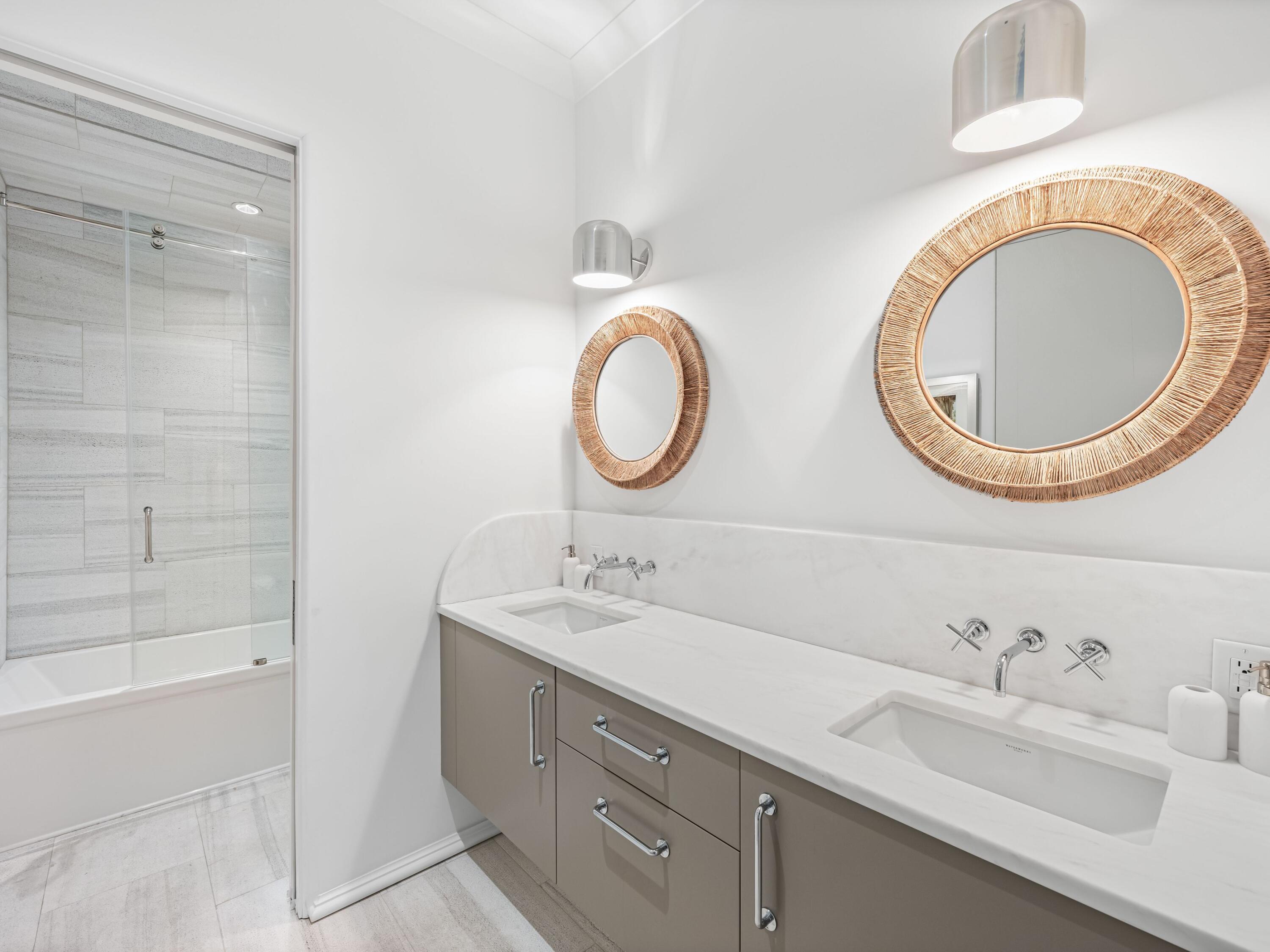 41 Elysee Ct Inlet Beach Inlet Beach, FL 32461 - Photo 36 of 68 a bathroom with a double vanity sink and a mirror