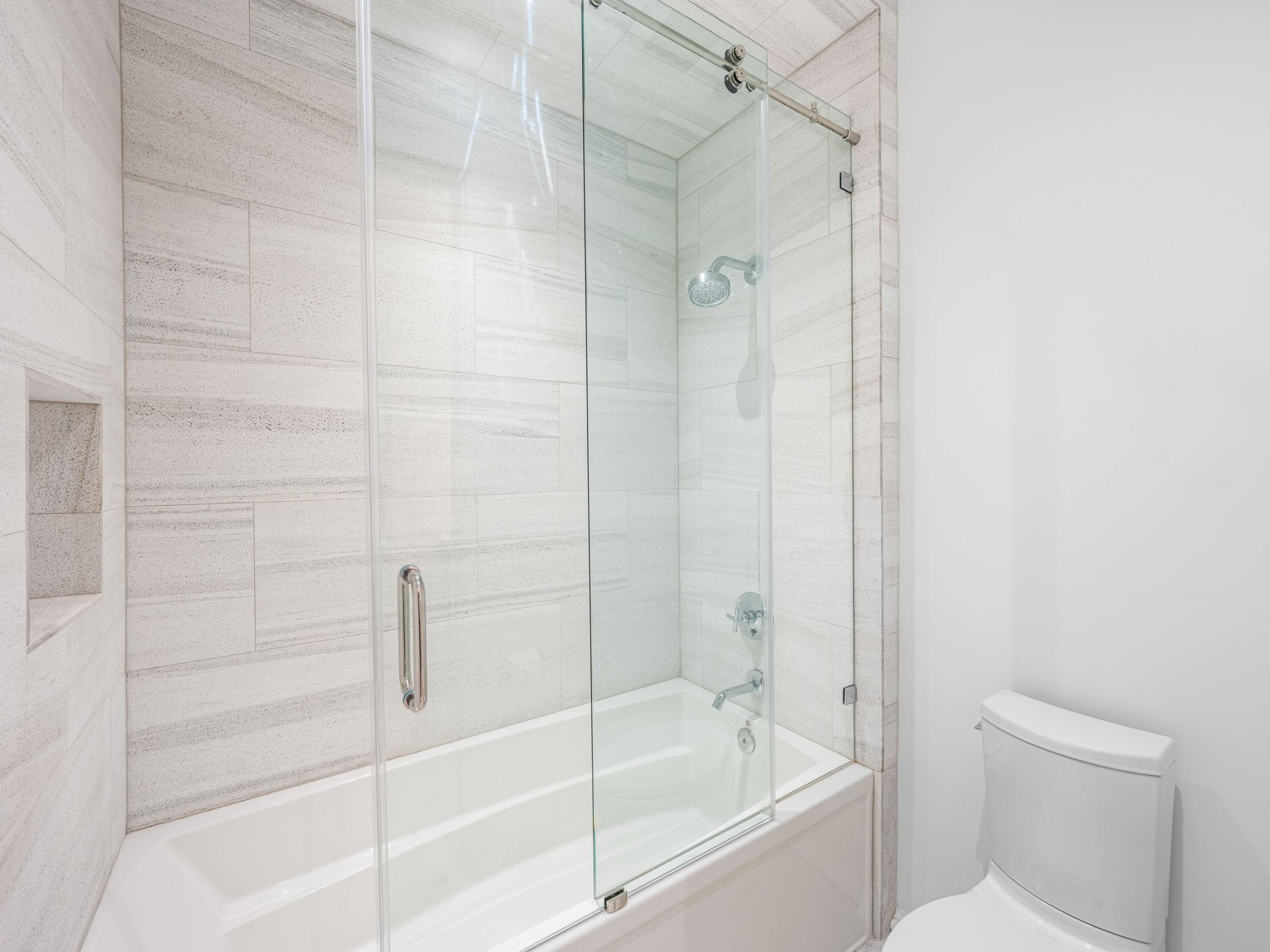 41 Elysee Ct Inlet Beach Inlet Beach, FL 32461 - Photo 37 of 68 a bathroom with a bathtub and a toilet