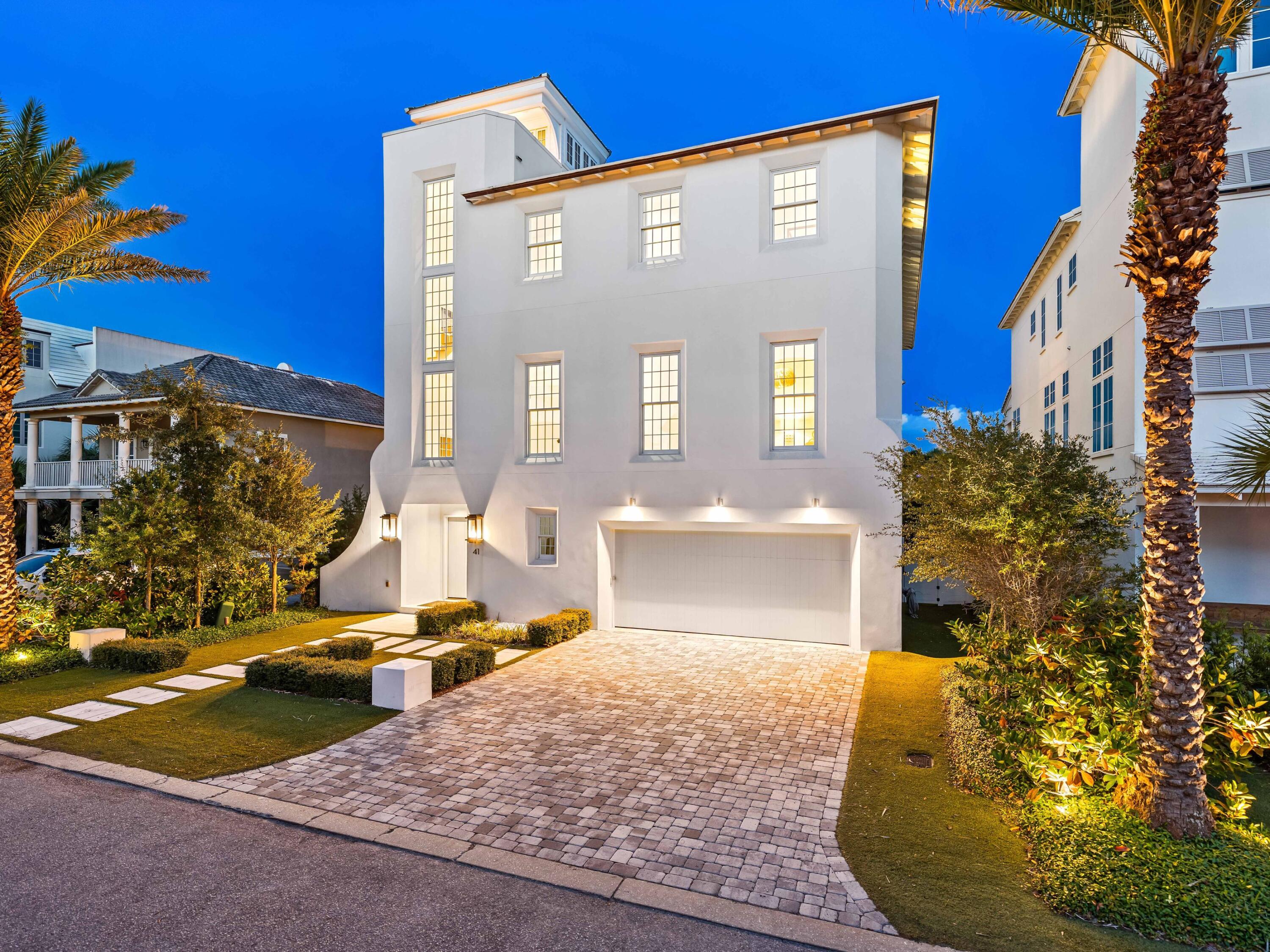 41 Elysee Ct Inlet Beach Inlet Beach, FL 32461 - Photo 4 of 68 a front view of a house with a yard