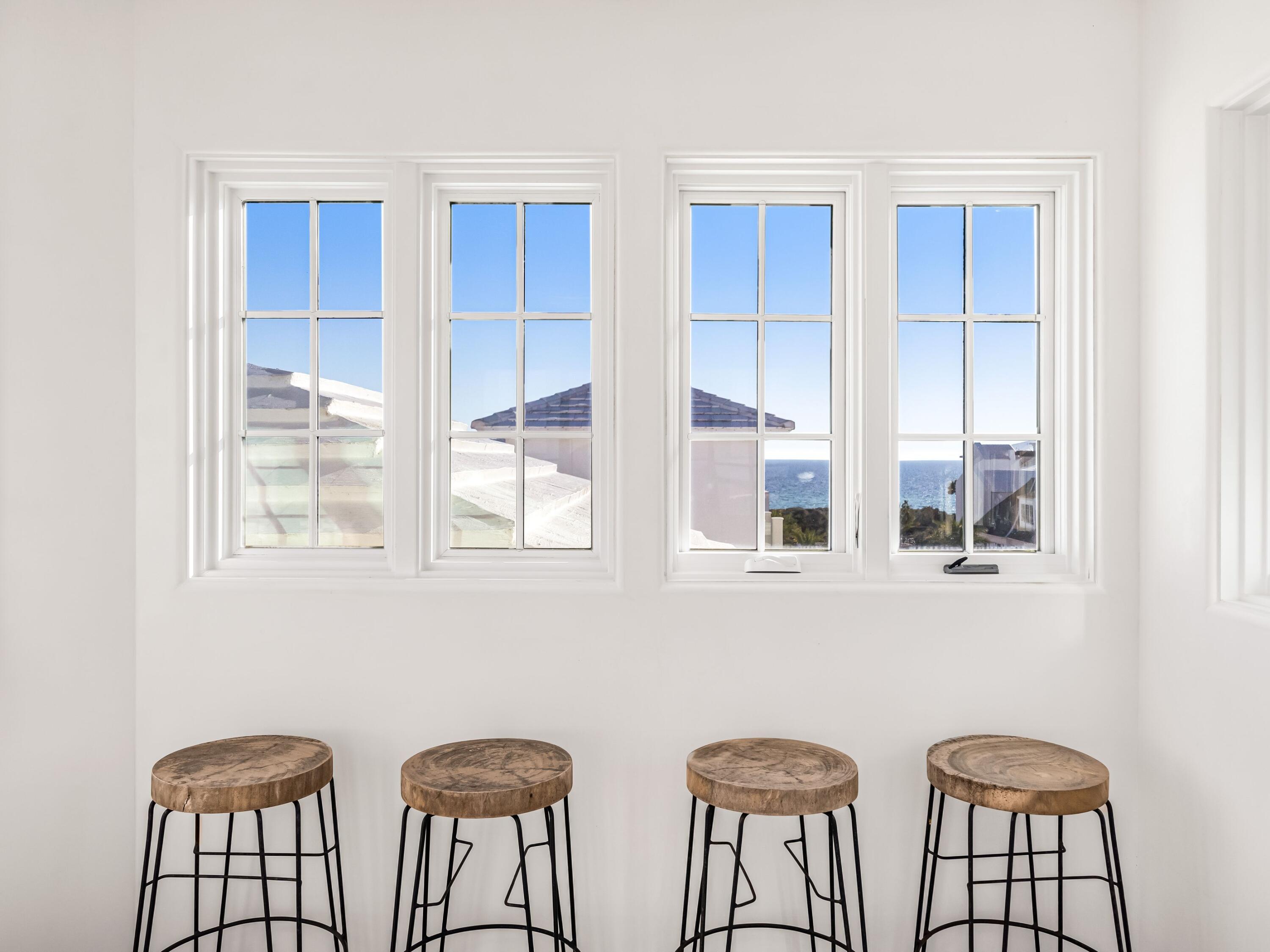 41 Elysee Ct Inlet Beach Inlet Beach, FL 32461 - Photo 48 of 68 a couple of table chair in a room