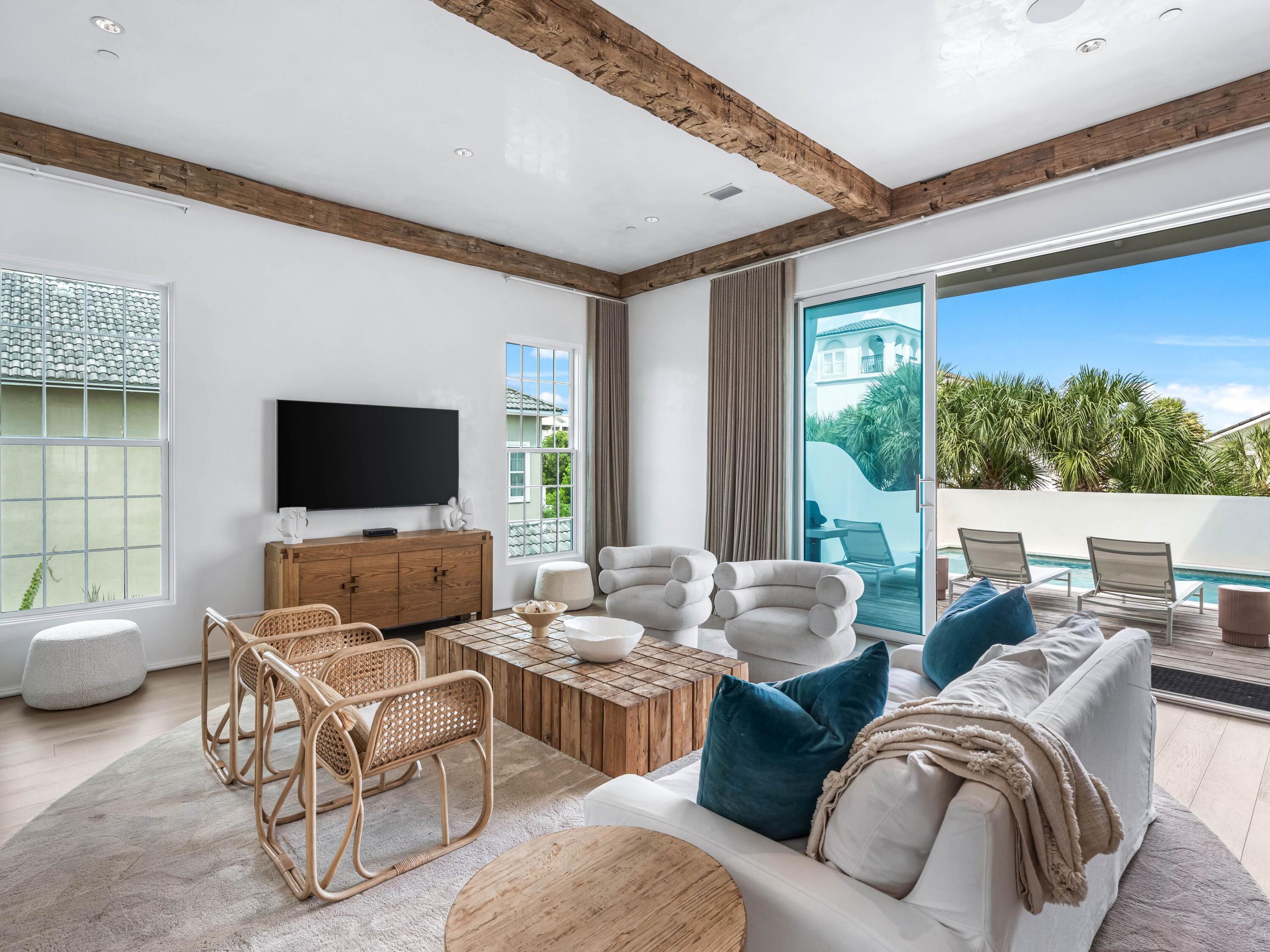 41 Elysee Ct Inlet Beach Inlet Beach, FL 32461 - Photo 6 of 68 a living room with furniture and a flat screen tv