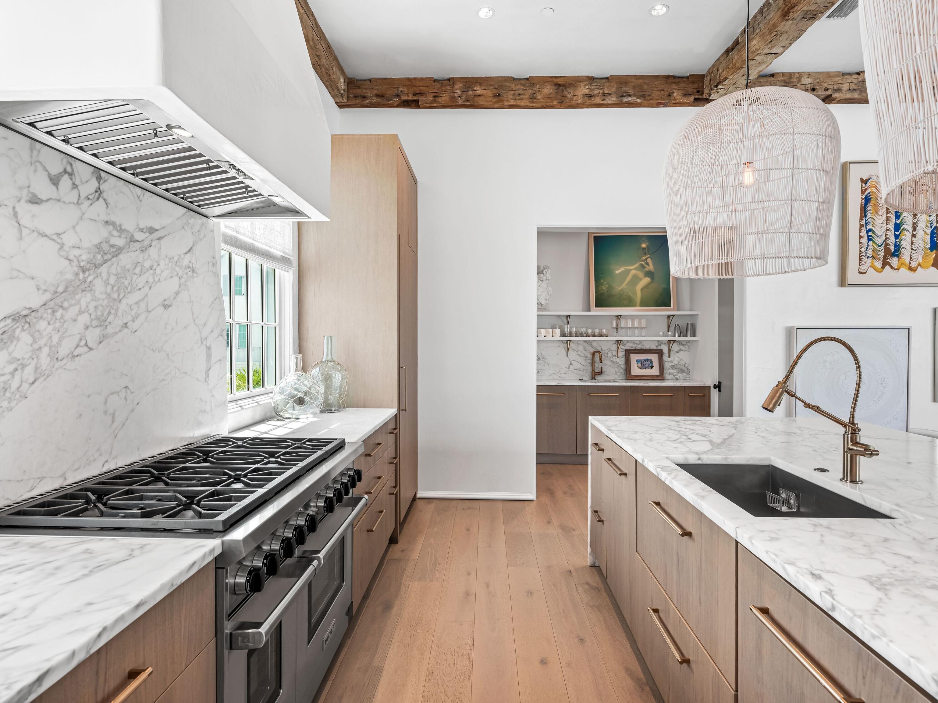 41 Elysee Ct Inlet Beach Inlet Beach, FL 32461 - Photo 8 of 68 a kitchen that has a sink and a stove