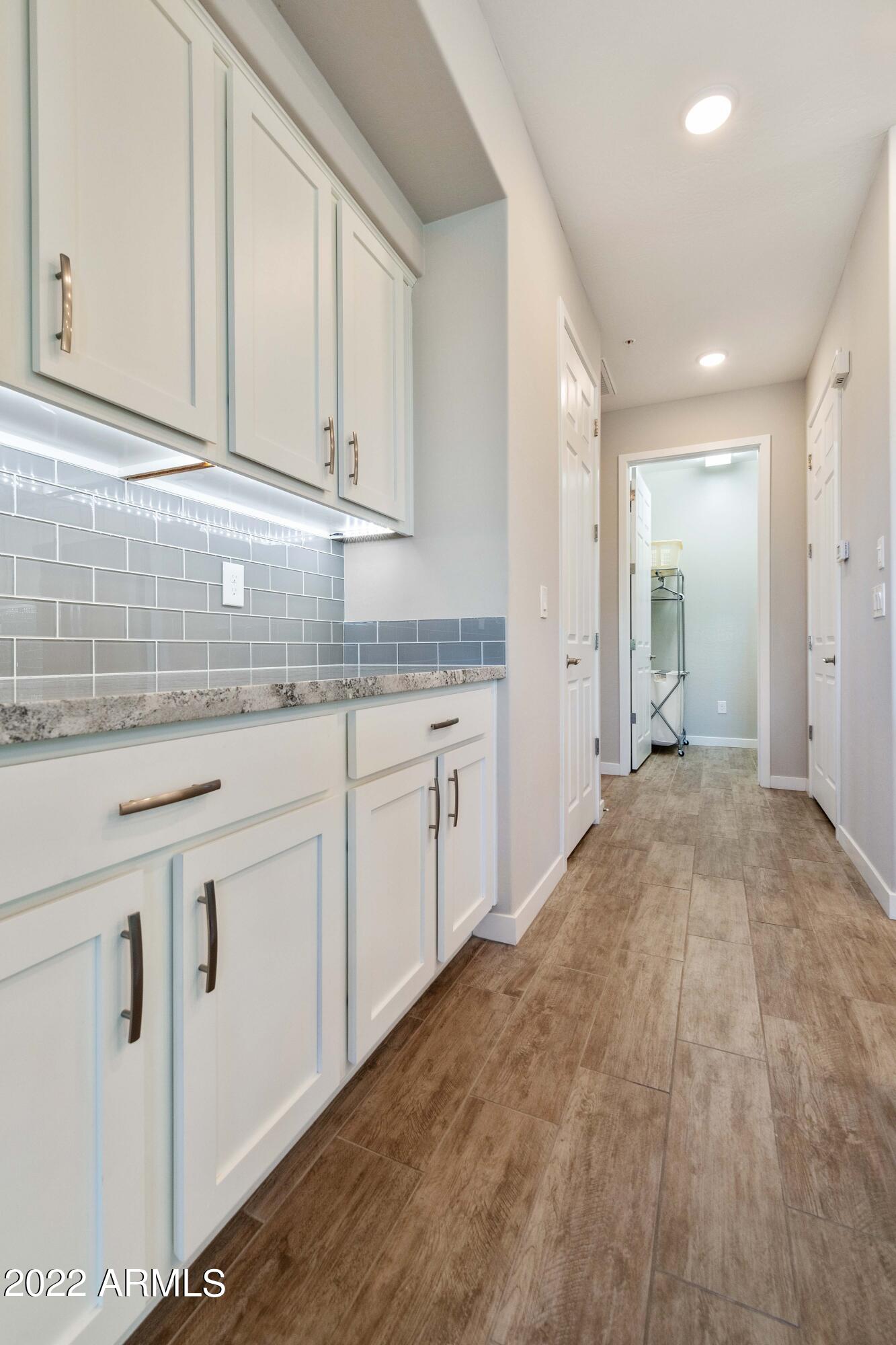 250 West Queen Creek Road, Unit 201 Chandler, AZ 85248 - Photo 14 of 29 Great Storage/Hall to Bedrooms 2 & 3