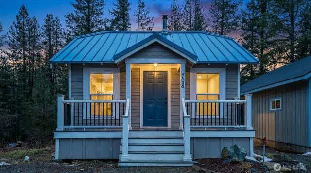 front view of a house with a yard