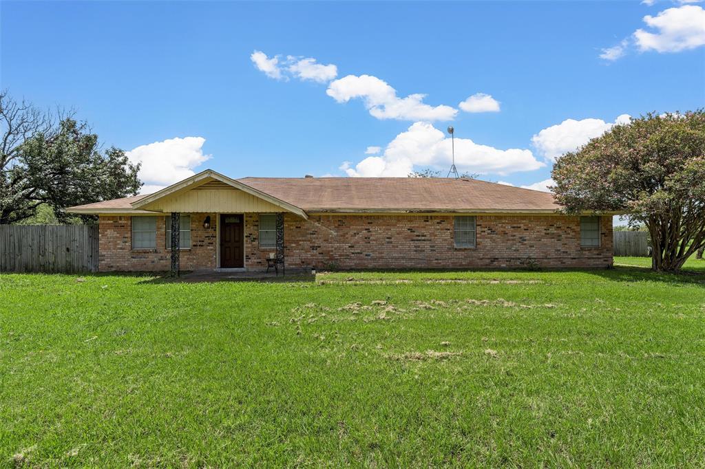 626 Sommerfeld Drive Waco, TX 76705 - Photo 3 of 26 a view of a house with a backyard