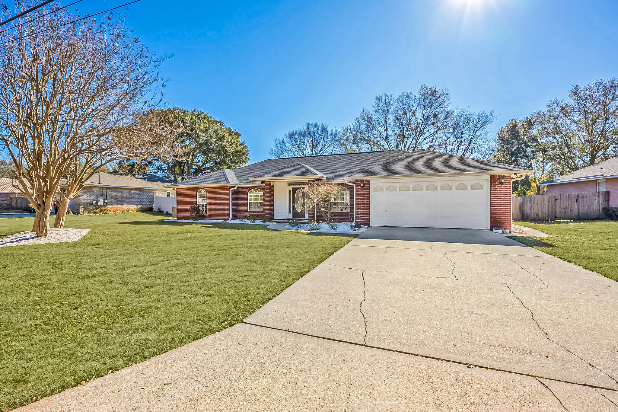 3421 Gardenview Road Pace, FL 32571 - Photo 1 of 26 a front view of house with yard