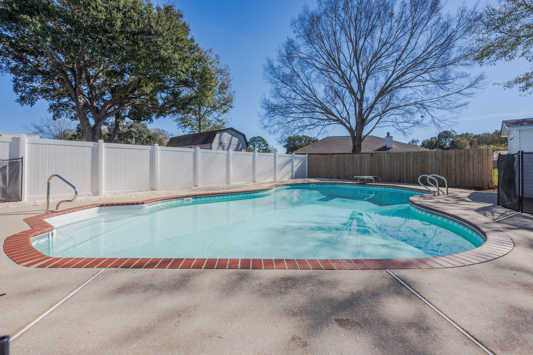 3421 Gardenview Road Pace, FL 32571 - Photo 3 of 26 a view of a backyard with a tree
