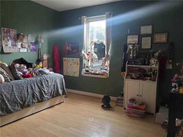 a bedroom with furniture and a couch