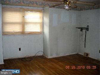1430 Rainer Road Brookhaven, PA 19015 - Photo 6 of 12 a view of a room with an empty space and a window