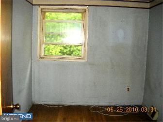 1430 Rainer Road Brookhaven, PA 19015 - Photo 7 of 12 a view of a room with rack and a window