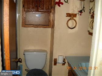 1430 Rainer Road Brookhaven, PA 19015 - Photo 9 of 12 a bathroom with a toilet and a shower
