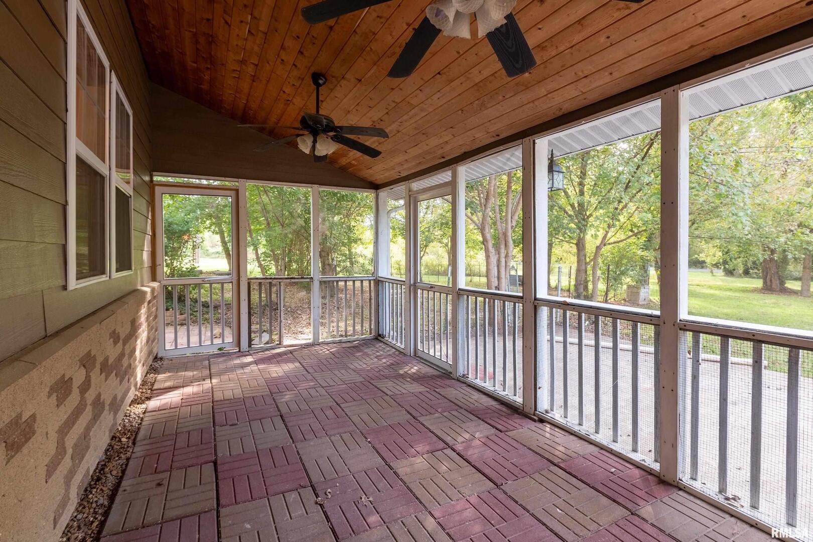 1591 North Reed Station Road Carbondale, IL 62901 - Photo 31 of 44 a view of a porch with wooden floor