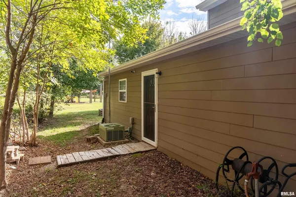 a view of a back yard of the house
