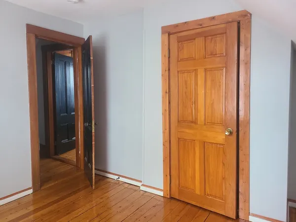 an empty room and wooden floor