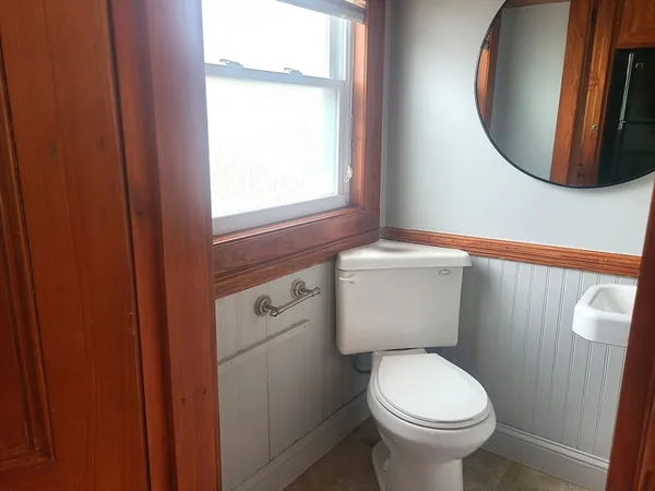 a bathroom with a toilet and a sink