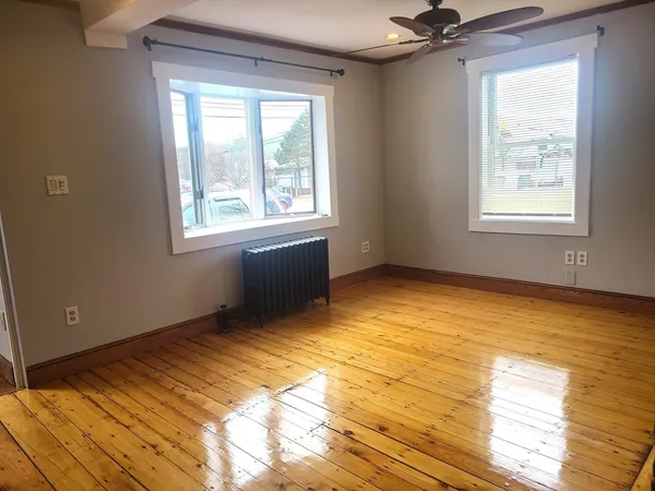 a view of an empty room and window