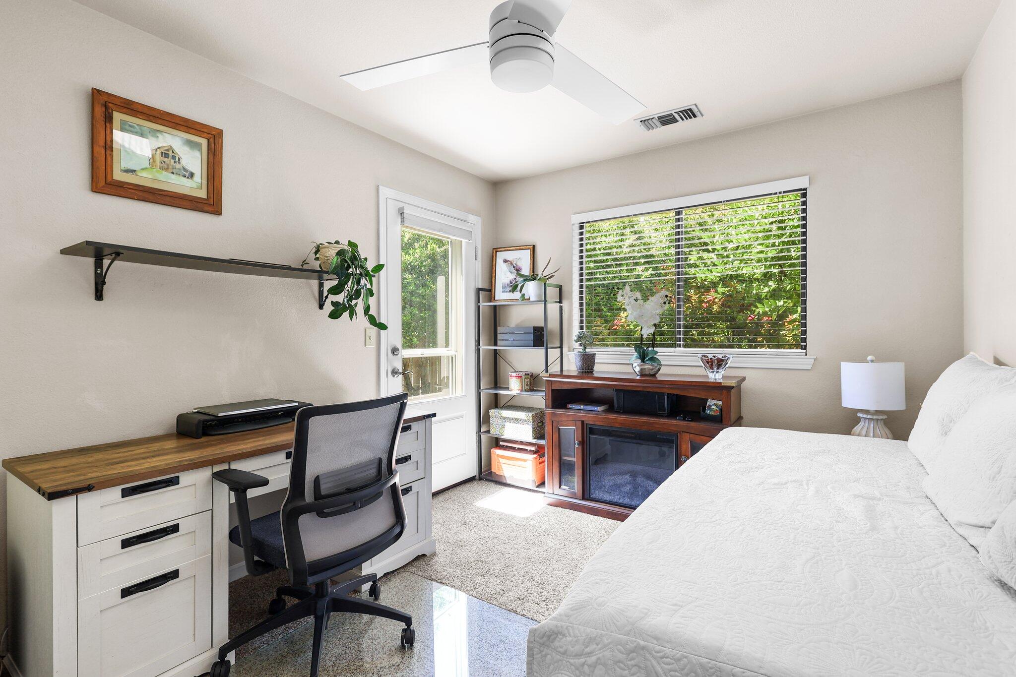2788 Summerbreeze Place Redding, CA 96001 - Photo 17 of 28 a living room with furniture a window and a potted plant
