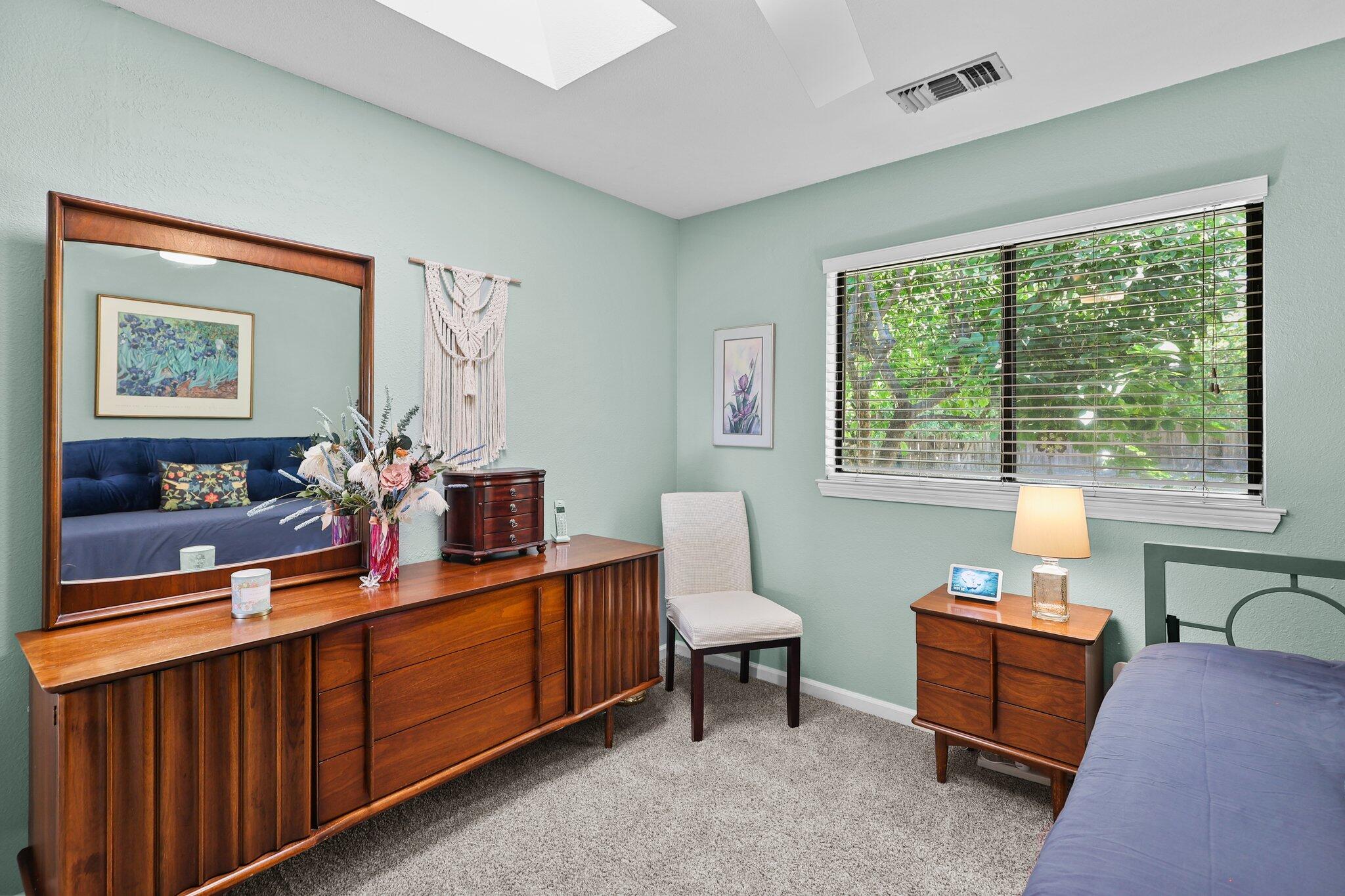 2788 Summerbreeze Place Redding, CA 96001 - Photo 19 of 28 a room with furniture and a window