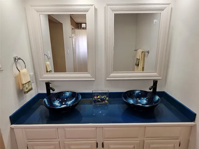 a view of wooden floor in a kitchen