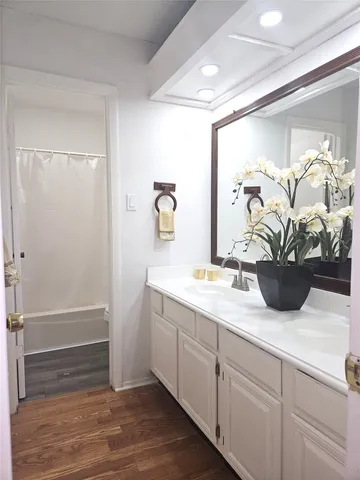 a view of bathroom with a potted plant