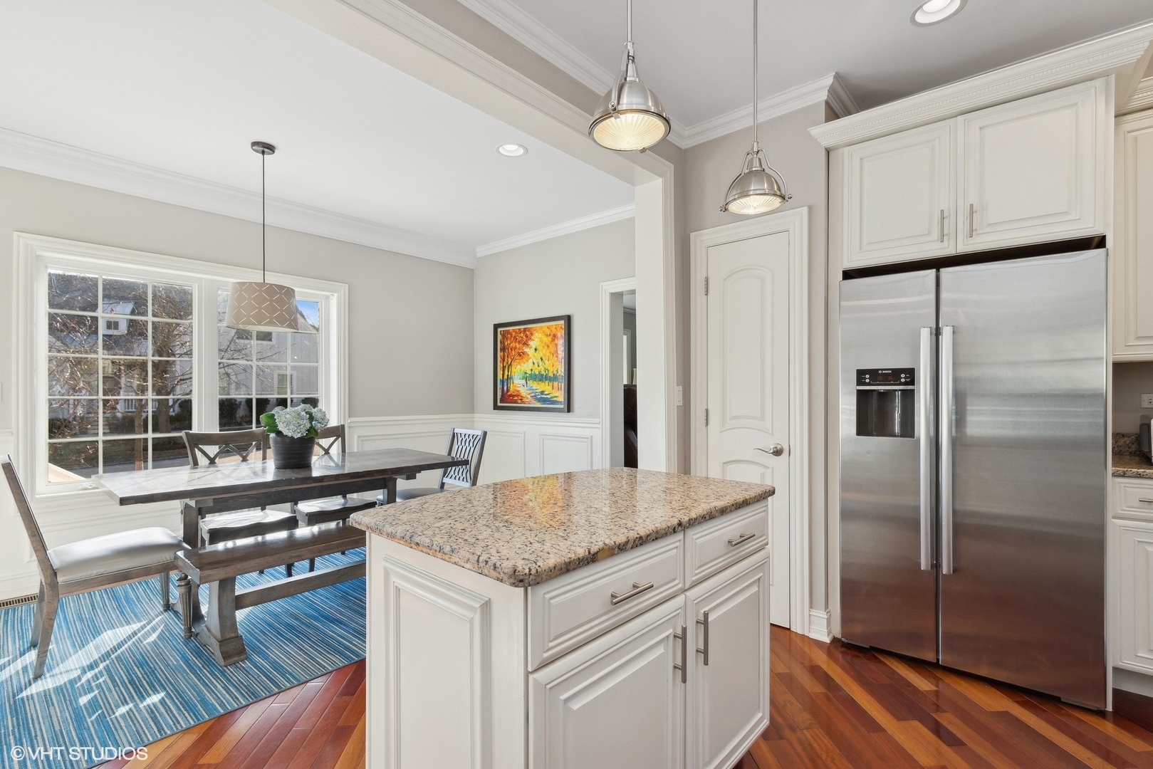 96 Washington Road Lake Forest, IL 60045 - Photo 5 of 20 a kitchen with kitchen island a counter top space appliances and a dining table