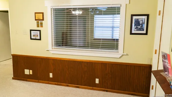 a view of a door and a window