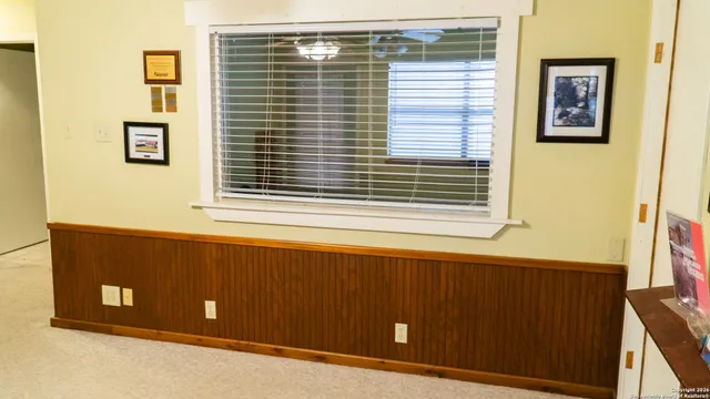 a view of a door and a window