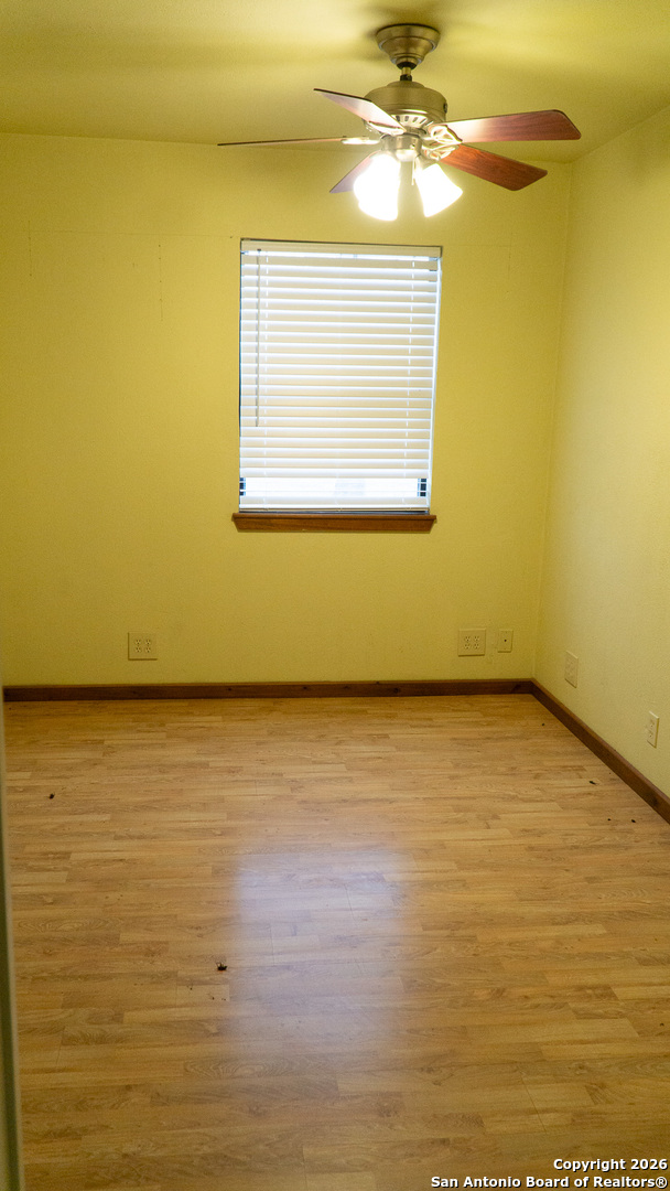 730 Main Street Utopia, TX 78884 - Photo 13 of 23 a view of a room with rack on the wall and a window