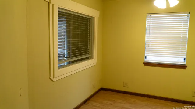 a view of a room that has a window
