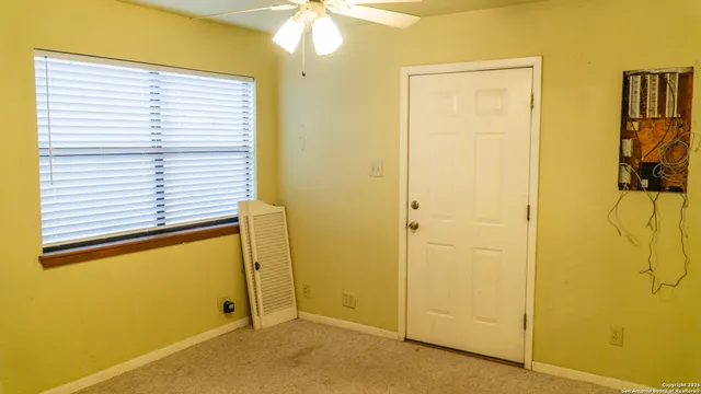 a view of a room with painted walls