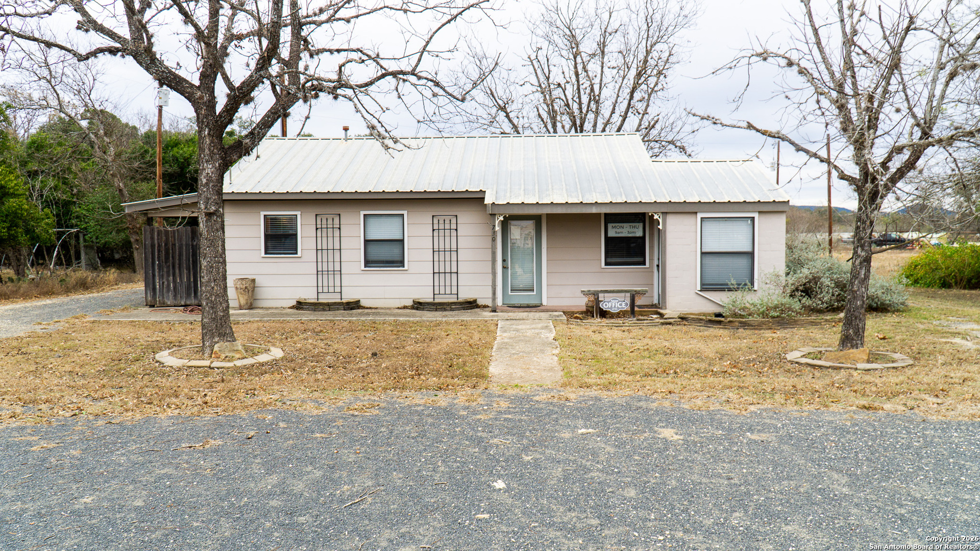 730 Main Street Utopia, TX 78884 - Photo 3 of 23 a front view of house with yard