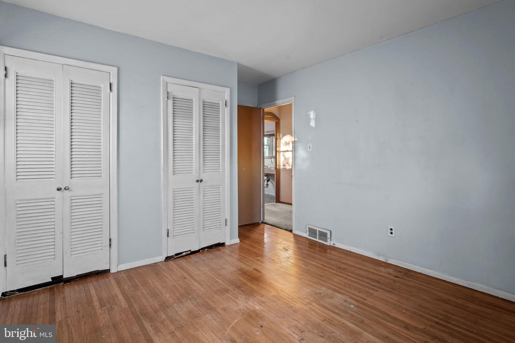 3723 Ridgewood Lane Brookhaven, PA 19015 - Photo 11 of 22 wooden floor in an empty room with a window